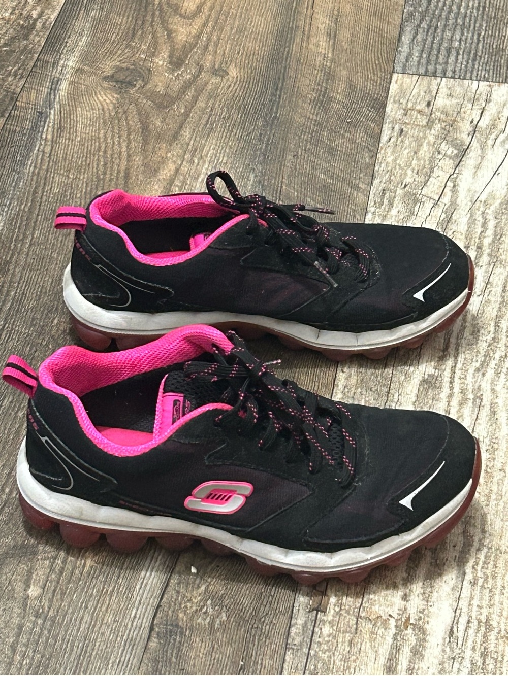 Skechers Women's Black Sneakers with Pink Highlights Size 7